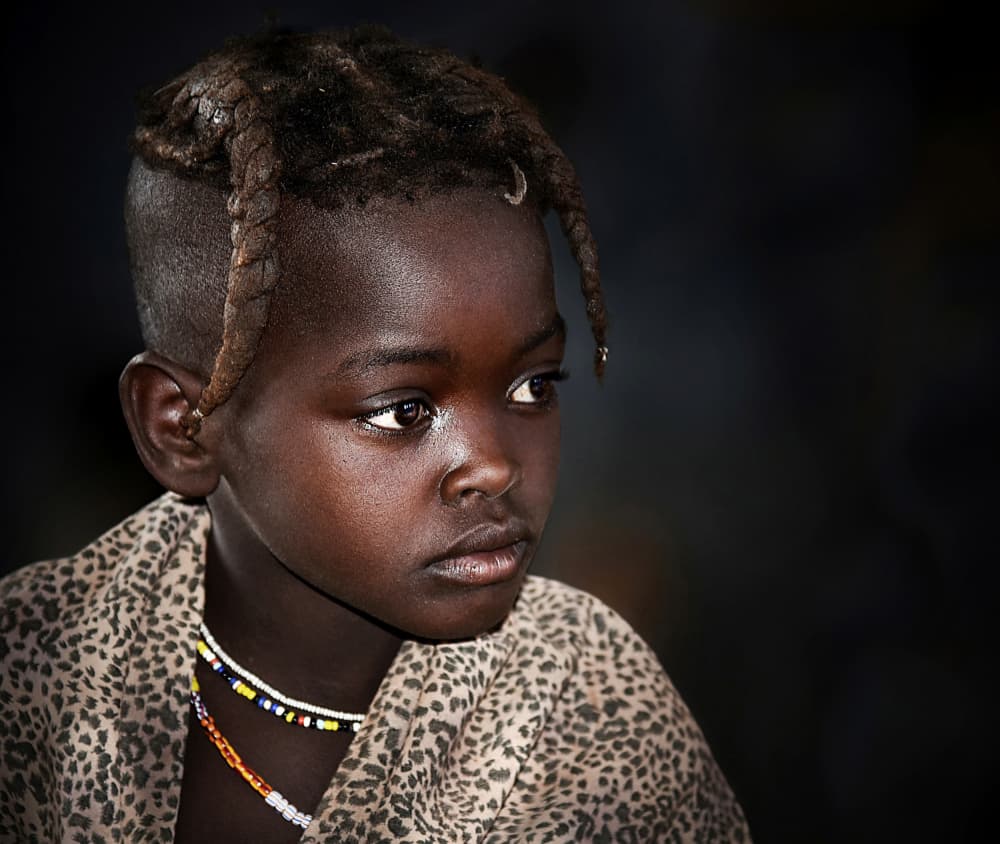 Thoughtful Braided Child by Irene Perovich — canvas wall art