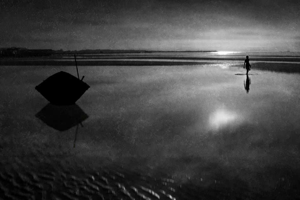 Moody Beach Reflections by Ekkachai Khemkum — canvas wall art