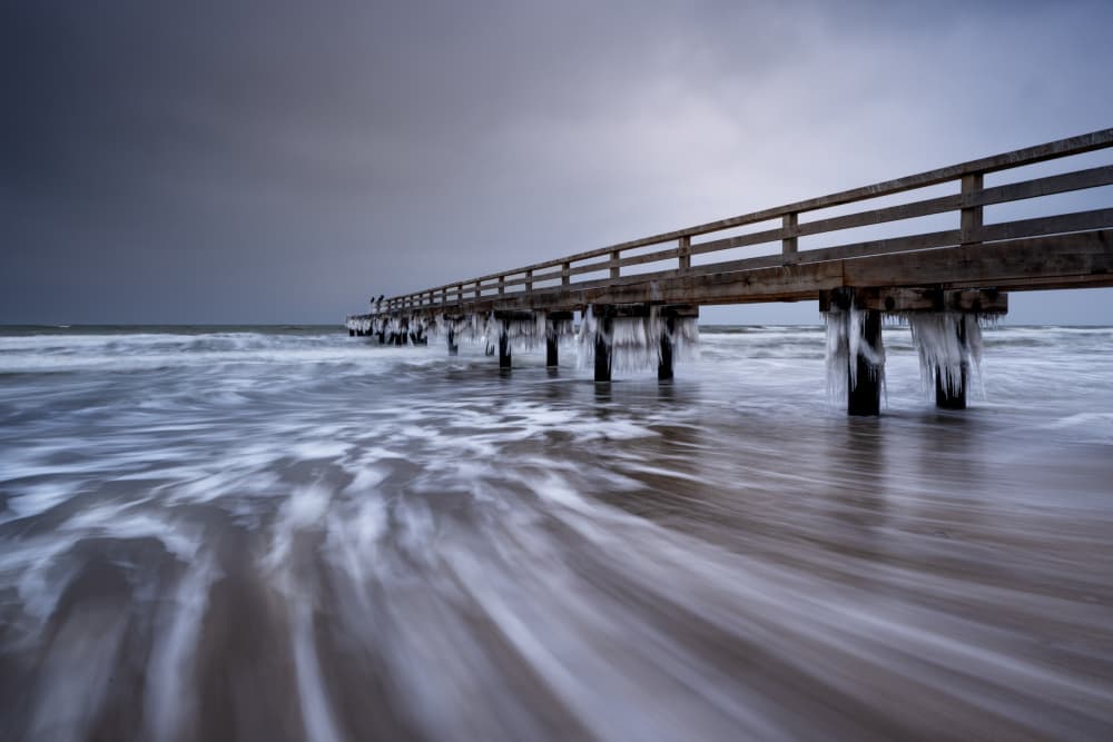 Icy Pier Winter Waves by fotomarion — canvas wall art
