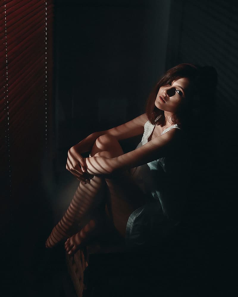 Pensive Woman Window Light by Djayent Abdillah — canvas wall art