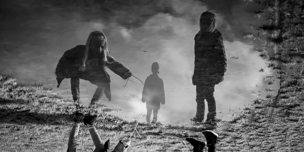 Kids Puddle Reflections by Leif Løndal — canvas wall art