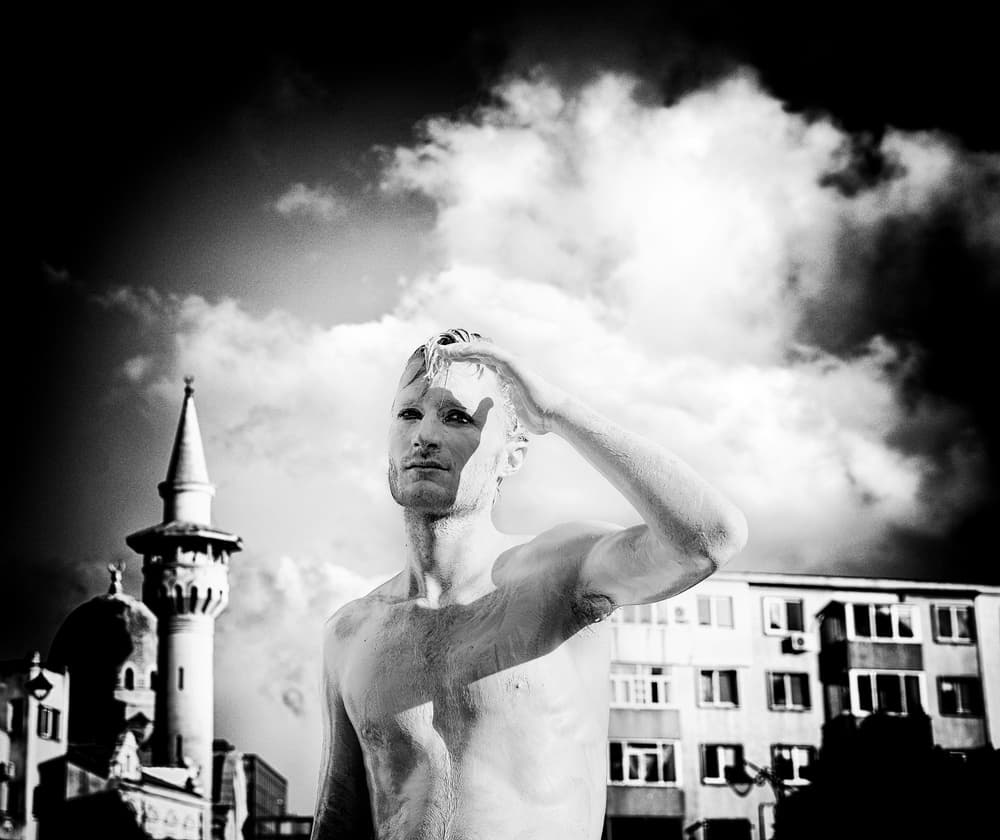 Pensive Man Urban Sky by Elena Raceala — canvas wall art