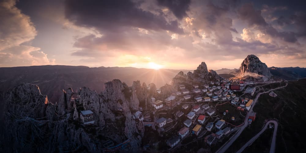 Dramatic Mountain Village Sunset by qiye — canvas wall art