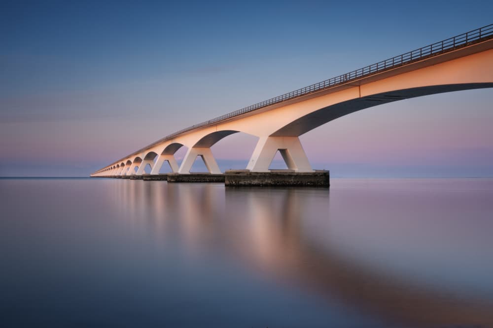 Pink Sky Bridge by fotomarion — canvas wall art