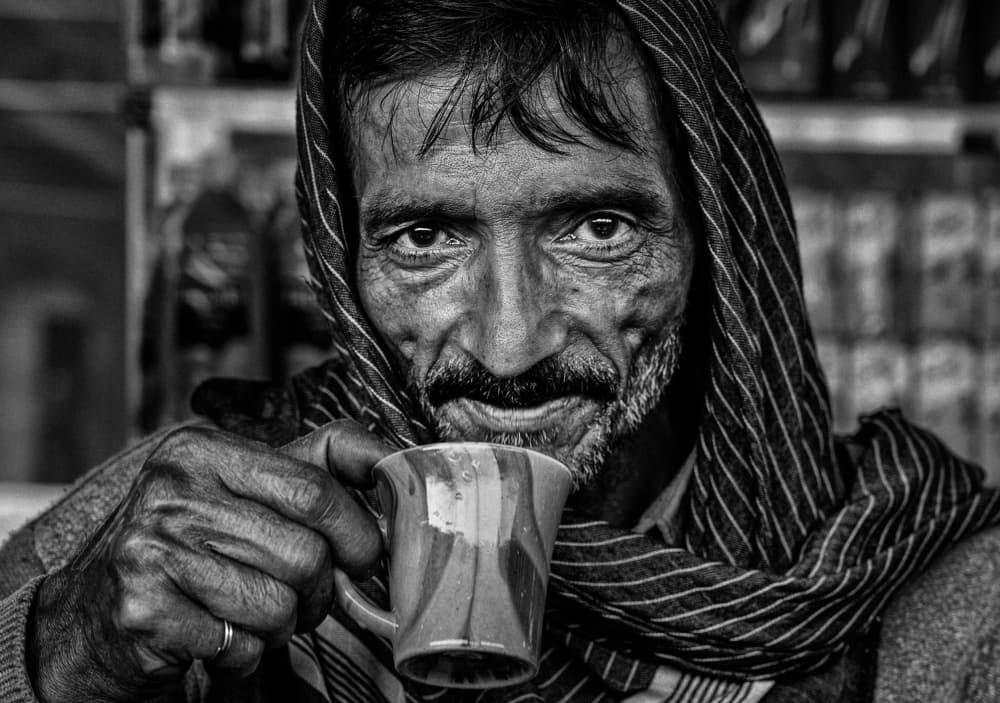 Smiling Man With Mug by Joxe Inazio Kuesta Garmendia — canvas wall art