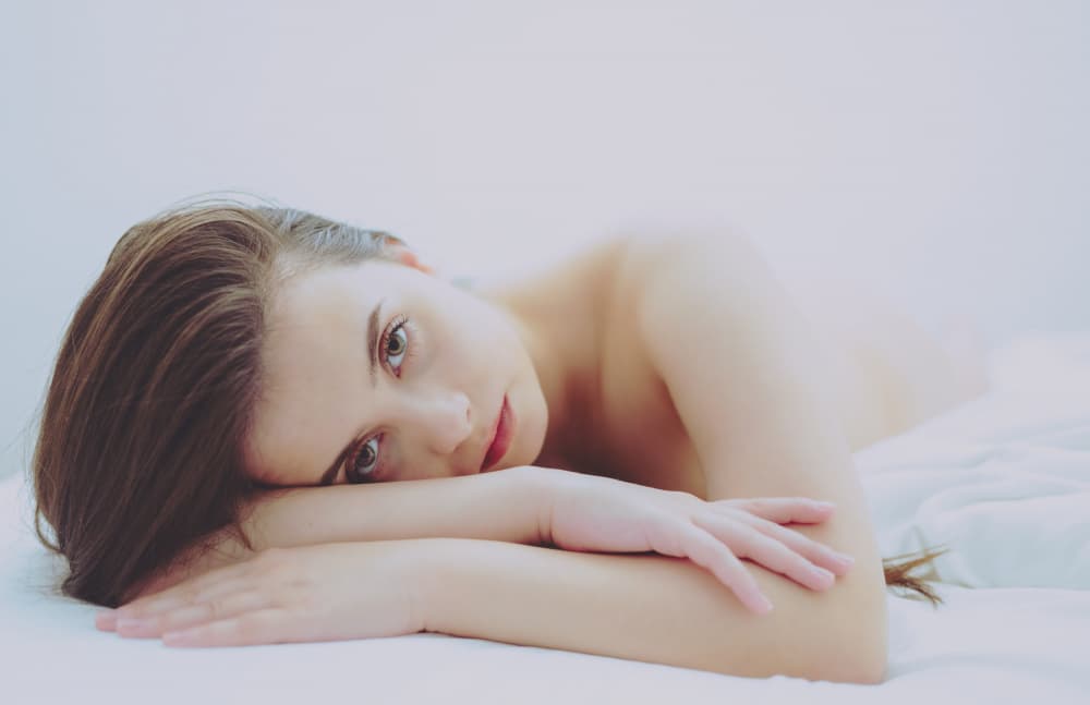 Serene Woman Resting by Guenther Koci purephoto.at — canvas wall art