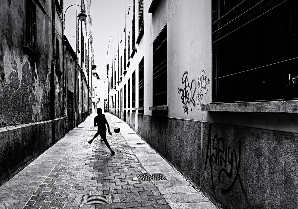 Urban Alley Soccer Play by Julien Oncete — canvas wall art