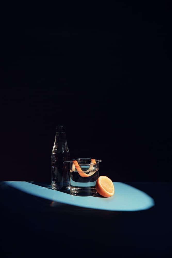 Dark Blue Citrus Drink by Julia Ramiro — canvas wall art