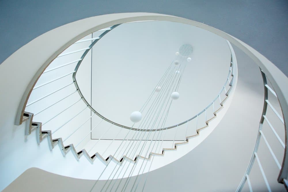 Elegant Spiral Staircase by Michael Allmaier — canvas wall art