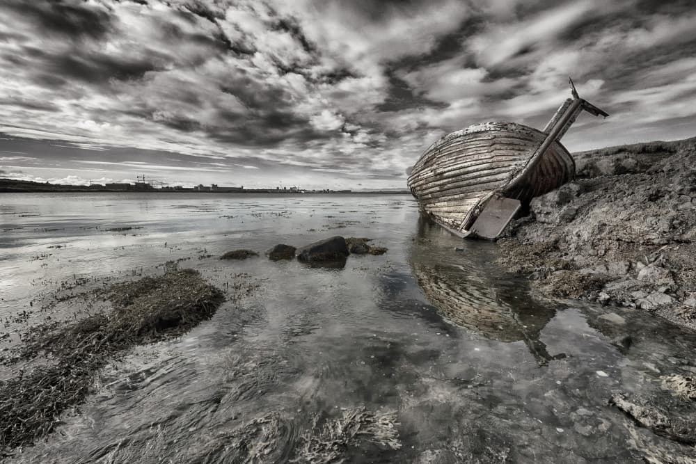 Weathered Boat Reflections by Þorsteinn H. Ingibergsson — canvas wall art