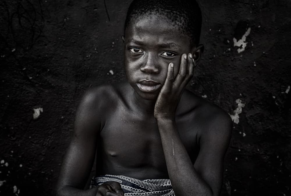 Pensive Young Boy by Joxe Inazio Kuesta Garmendia — canvas wall art