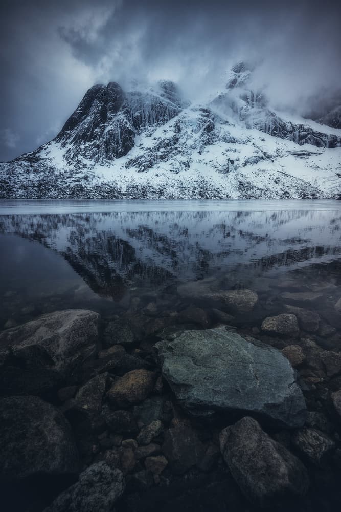 Dramatic Winter Mountain Lake by Carlos Gonzalez — canvas wall art