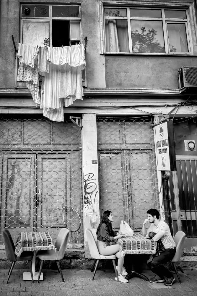 Urban Cafe Conversation by Michel Groleau — canvas wall art