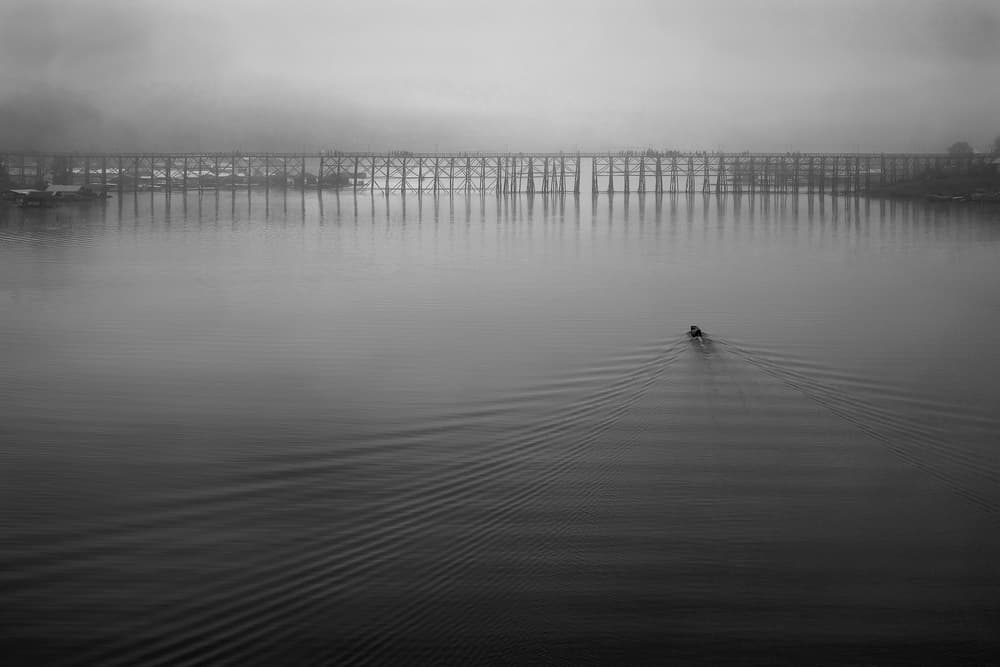 Lone Boat Misty River by Ekkachai Khemkum — canvas wall art