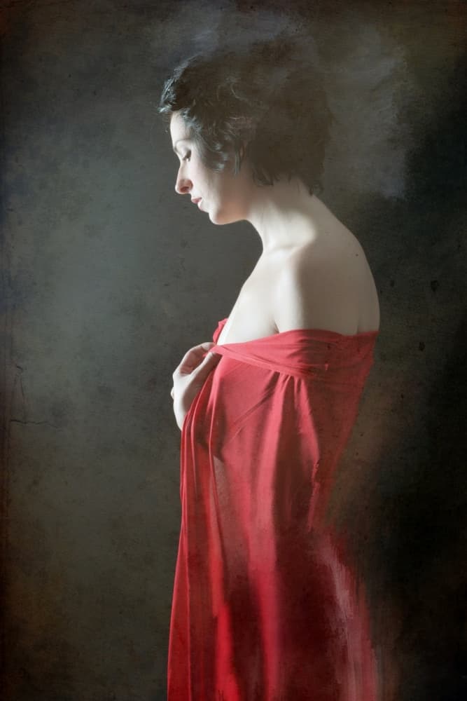 Pensive Woman in Red by Olga Mest — canvas wall art