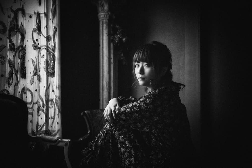 Pensive Woman in Shadow by Nobu Ishijima — canvas wall art