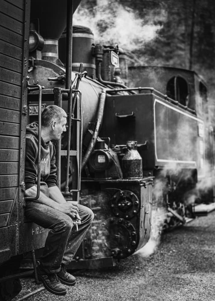 Man On Vintage Train by Robert Girmencea — canvas wall art