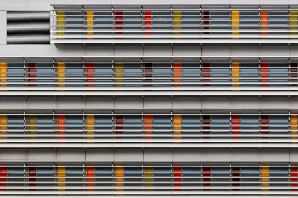 Vibrant Building Facade by Theo Luycx — canvas wall art