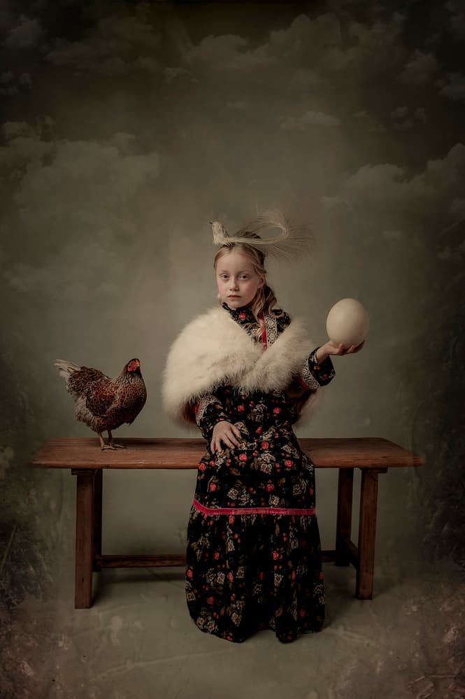 Little Girl With Ostrich Egg by Monika Vanhercke — canvas wall art