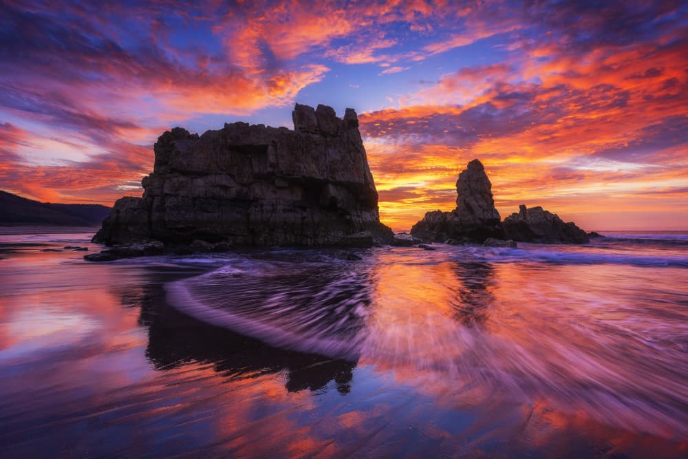 Vibrant Sunset Sea Stacks by Rodrigo Núñez Buj — canvas wall art
