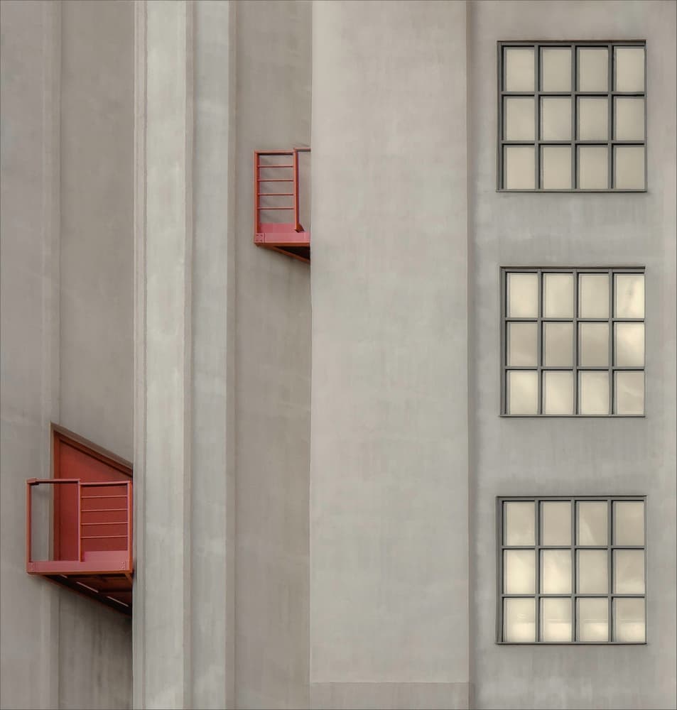 Red Balconies Gray Facade by Gilbert Claes — canvas wall art