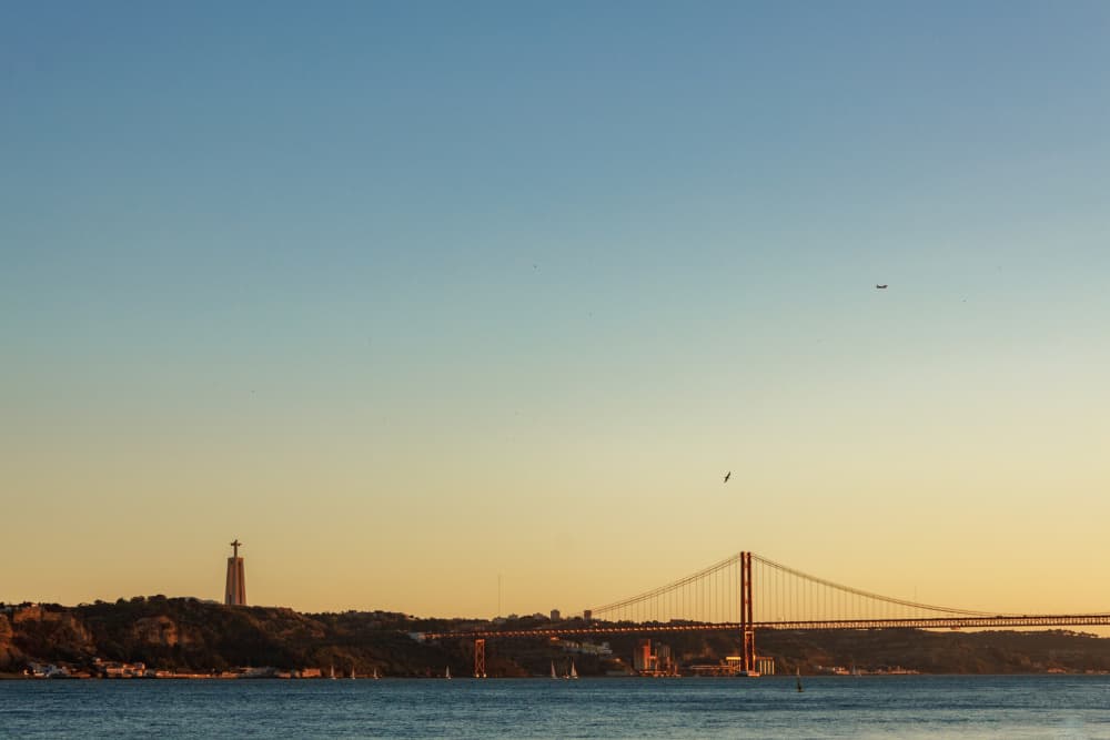 Lisbon Sunset Suspension Bridge by Aimee Giles — canvas wall art