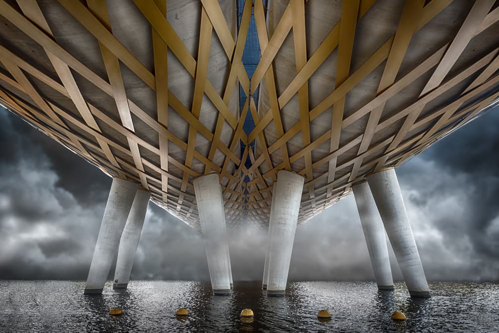 Modern Bridge Under Stormy Sky by Michiel Hageman — canvas wall art