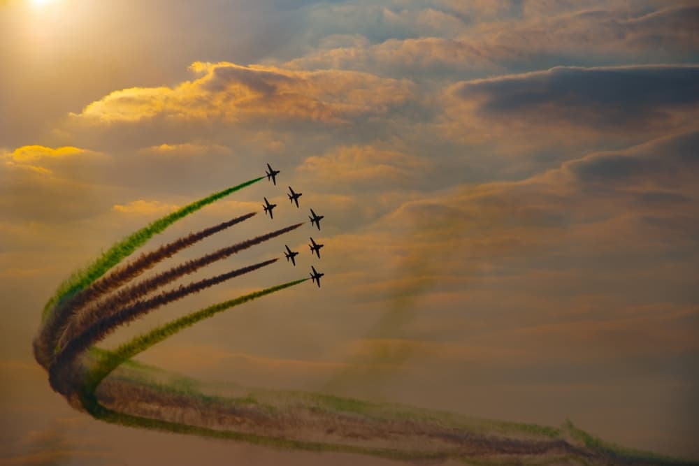 Aerobatic Jet Trails Sunset by Mrinal Nath — canvas wall art