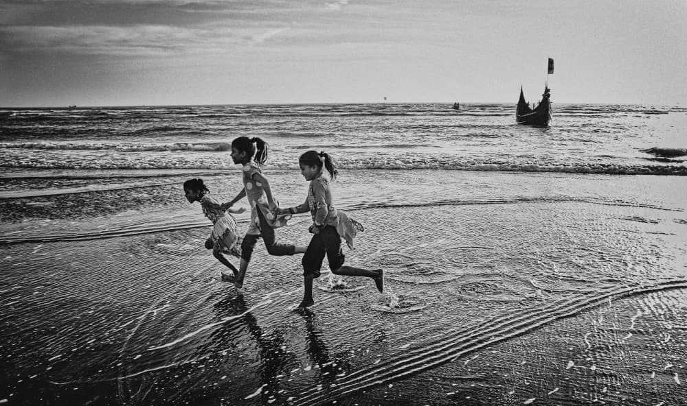 Joyful Beach Runners by Garik — canvas wall art