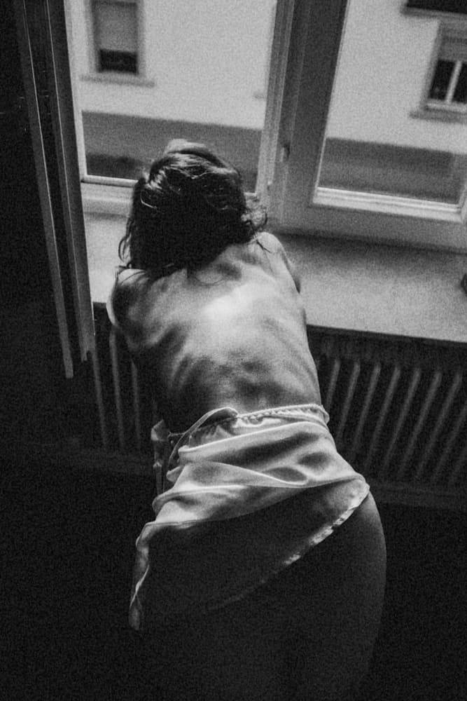 Pensive Woman Window View by Bogdan Bouşcă — canvas wall art