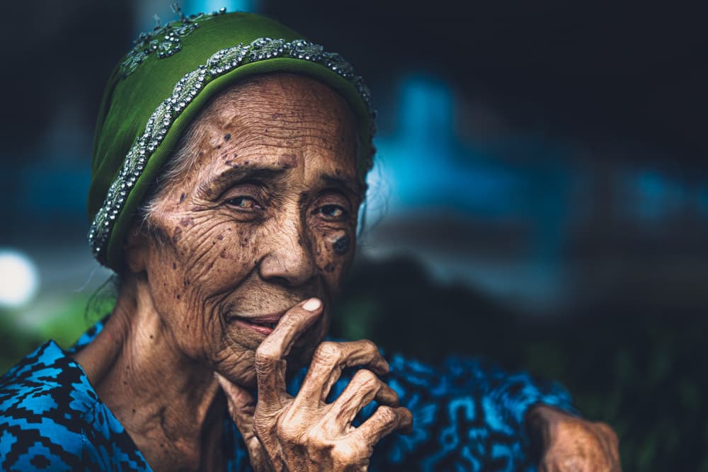 Thoughtful Elderly Woman by Marco Tagliarino — canvas wall art