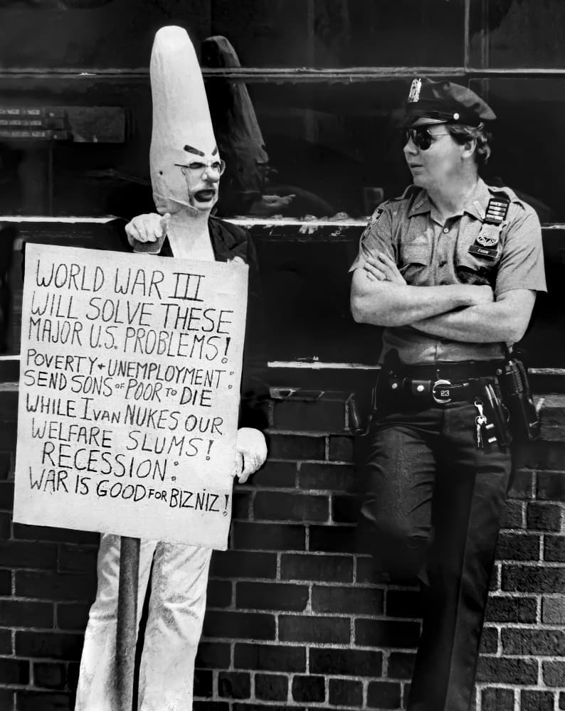 Satirical Protest Officer by Michael Castellano — canvas wall art