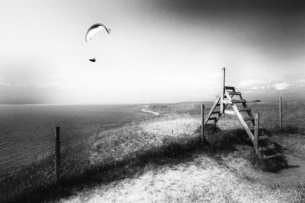 Coastal Paraglider View by Gustav Davidsson — canvas wall art