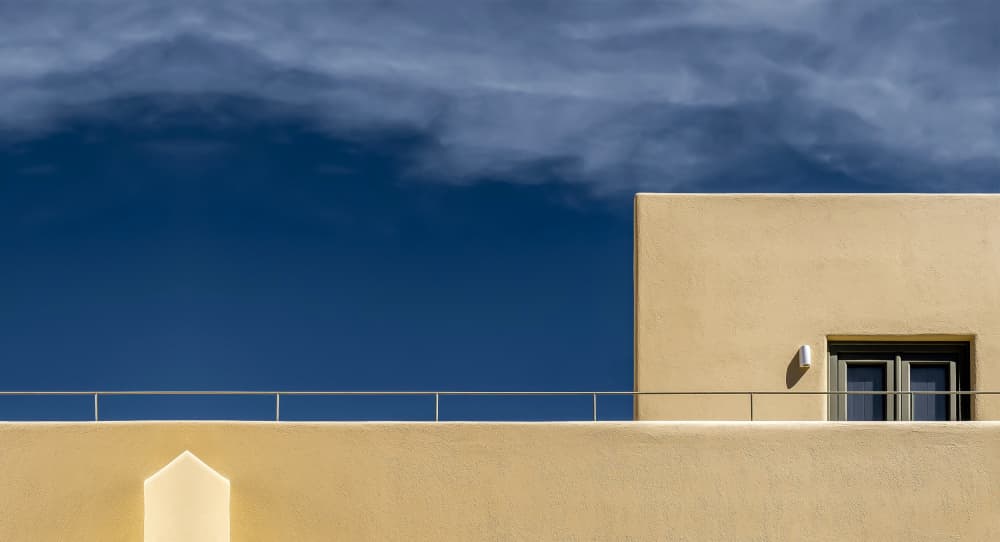 Tan Building Blue Sky by Markus Auerbach — canvas wall art