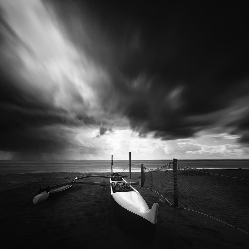 Dramatic Beach Outrigger by Massimo Della Latta — canvas wall art