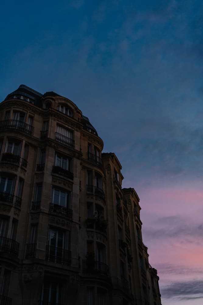 Parisian Building Dusk by Bethany Young — canvas wall art
