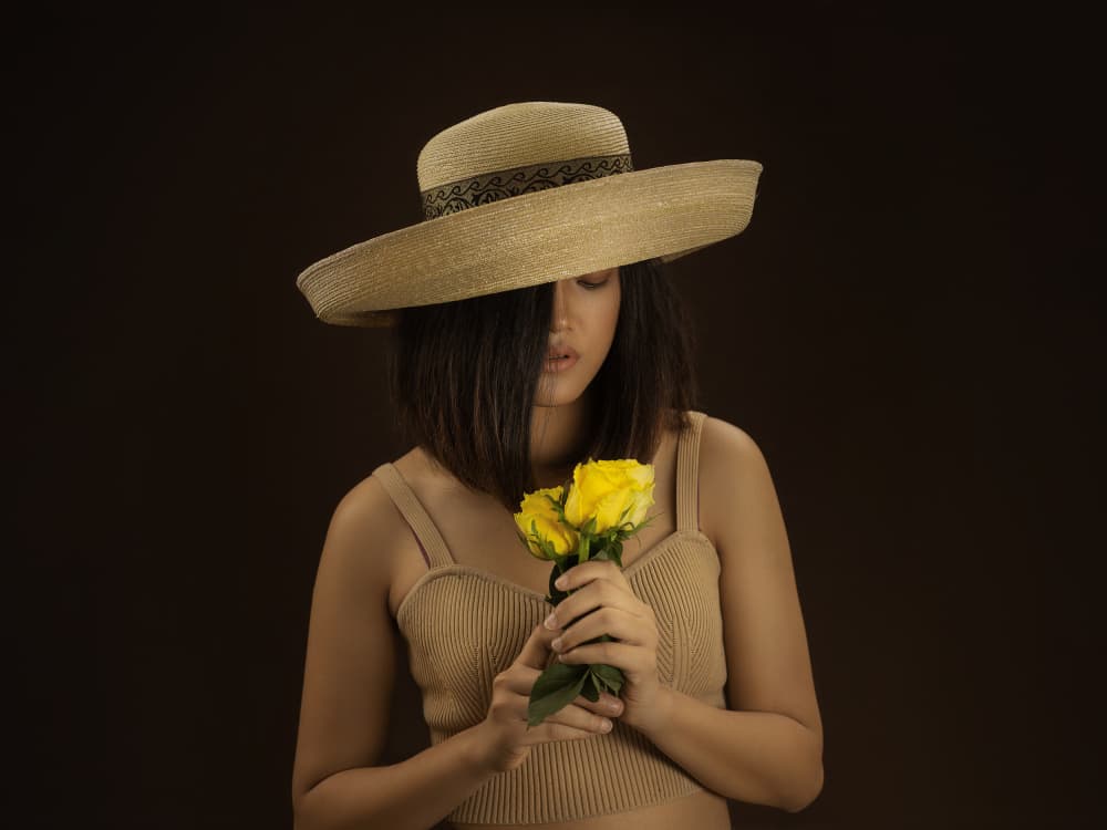Woman With Yellow Roses by Michael Allmaier — canvas wall art