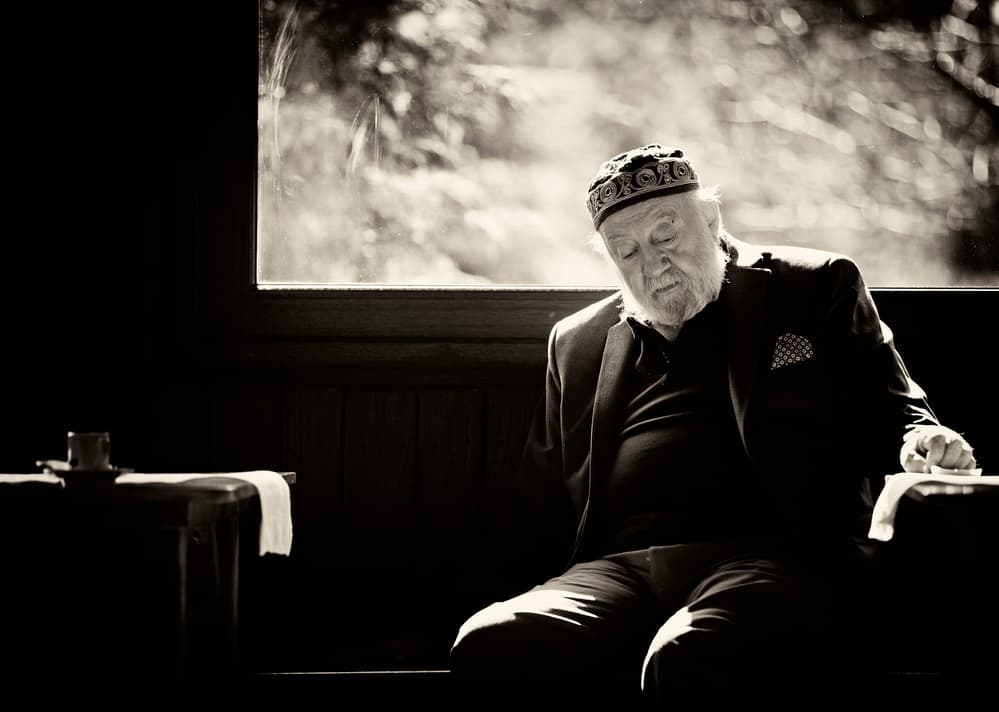 Old Man by Window by Julien Oncete — canvas wall art