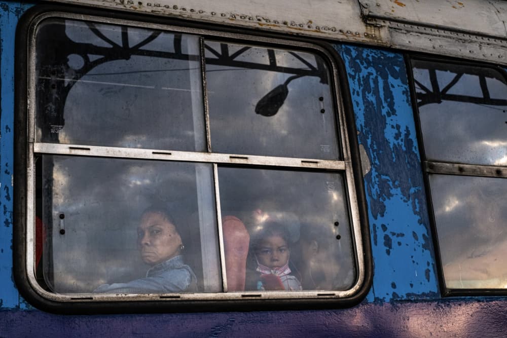 Bus Window Reflections by Bego Amare — canvas wall art