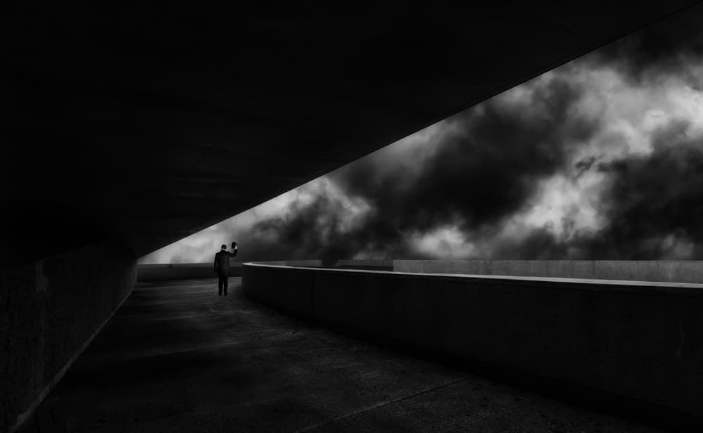 Man Under Stormy Sky by Luc Stalmans — canvas wall art