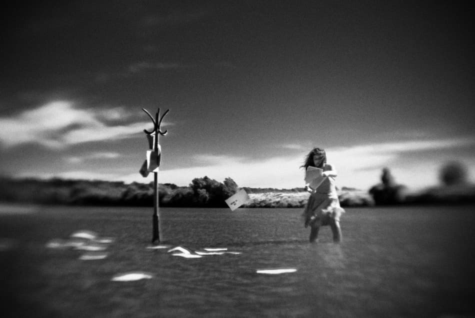 Solitary Girl Deep Water by Codrin Lupei — canvas wall art