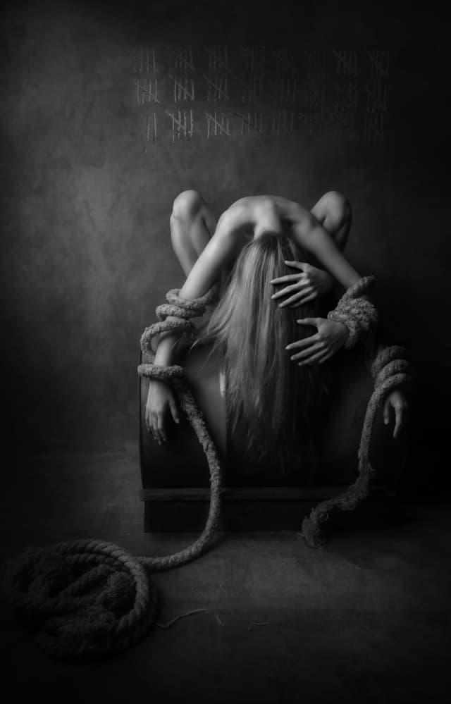 Bound Woman's Struggle by Sebastian Kisworo — canvas wall art