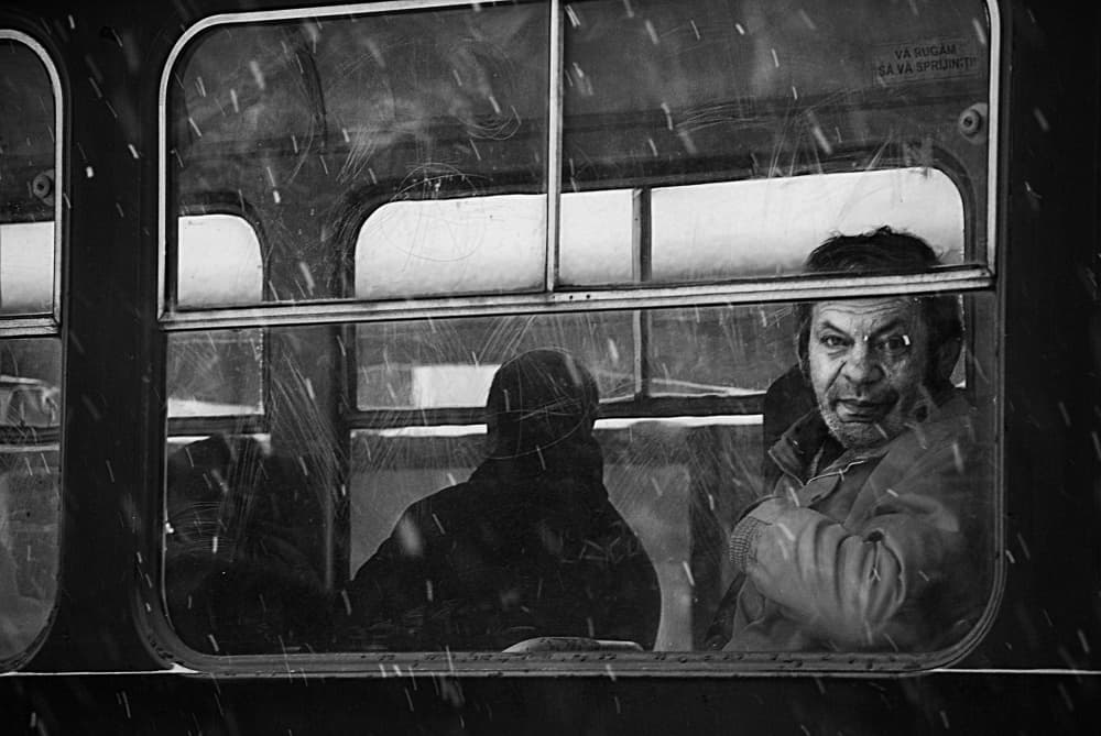 Man In Snowy Window by Nicoleta Gabor — canvas wall art