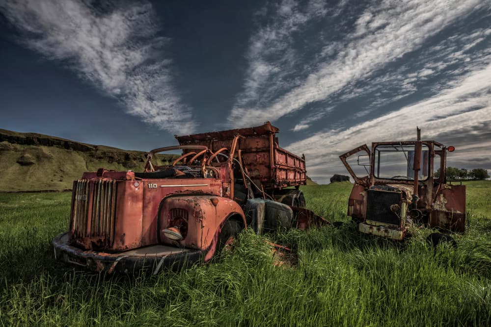Abandoned Farm Trucks by Bragi Ingibergsson - BRIN — canvas wall art