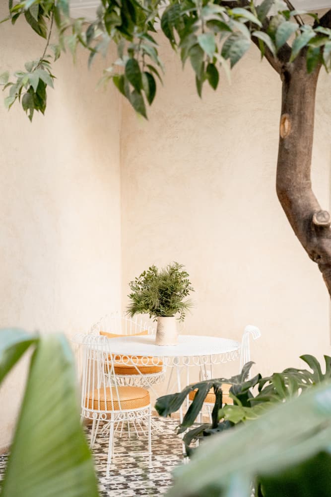 Cozy Courtyard Seating by Henrike Schenk — canvas wall art