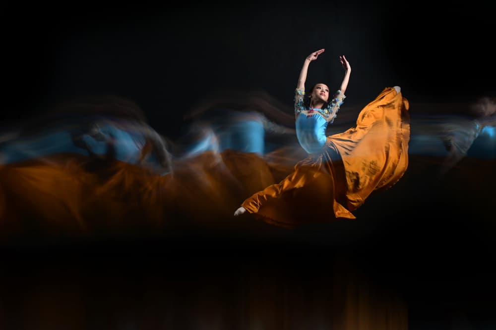 Dancer's Ethereal Leap by Rawisyah Aditya — canvas wall art