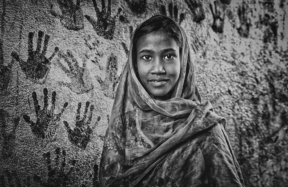Smiling Girl Handprints by Avishek Das — canvas wall art