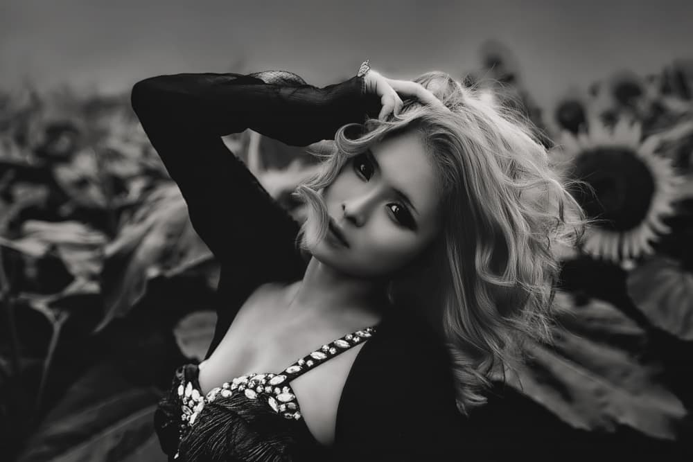 Moody Blonde In Sunflowers by KOIKI — canvas wall art