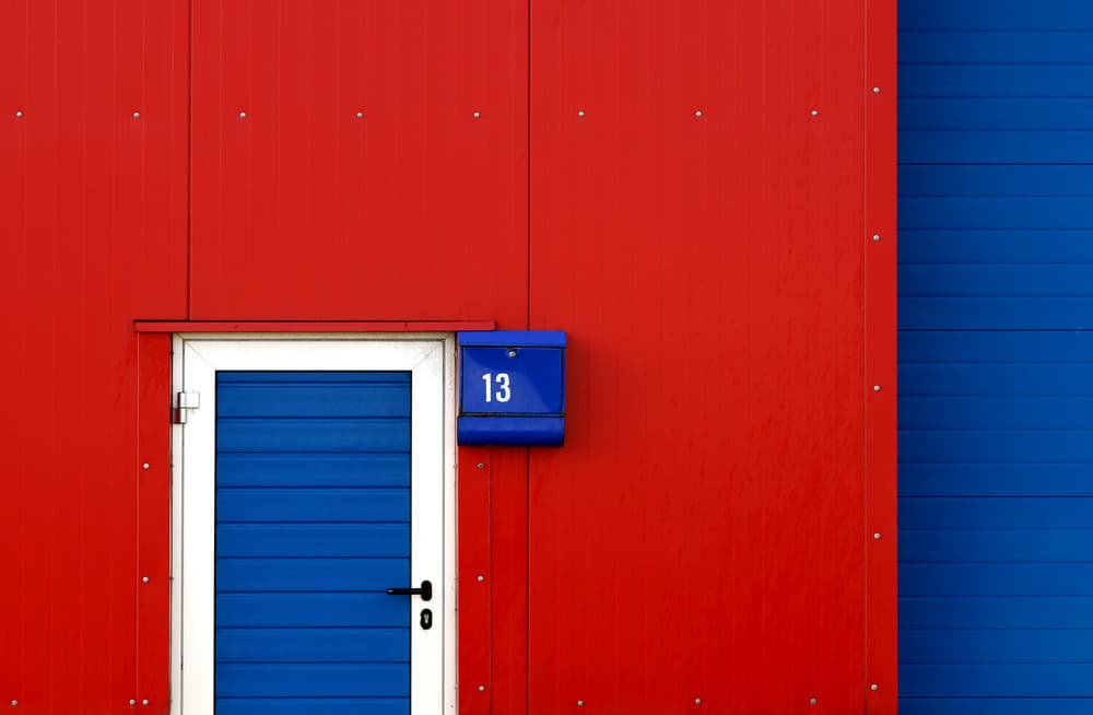 Red Wall Blue Door by Hans-Wolfgang Hawerkamp — canvas wall art