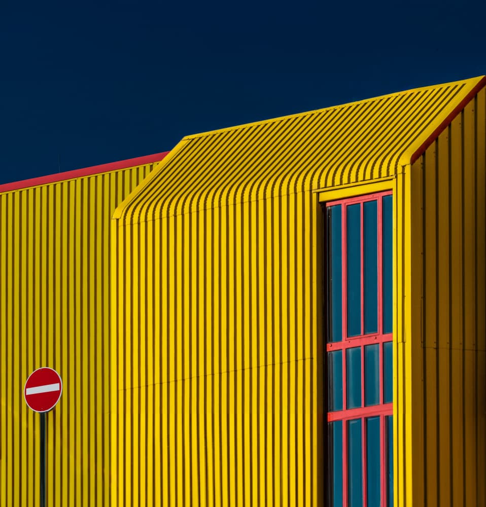 Bright Yellow Building by Stephan Rückert — canvas wall art